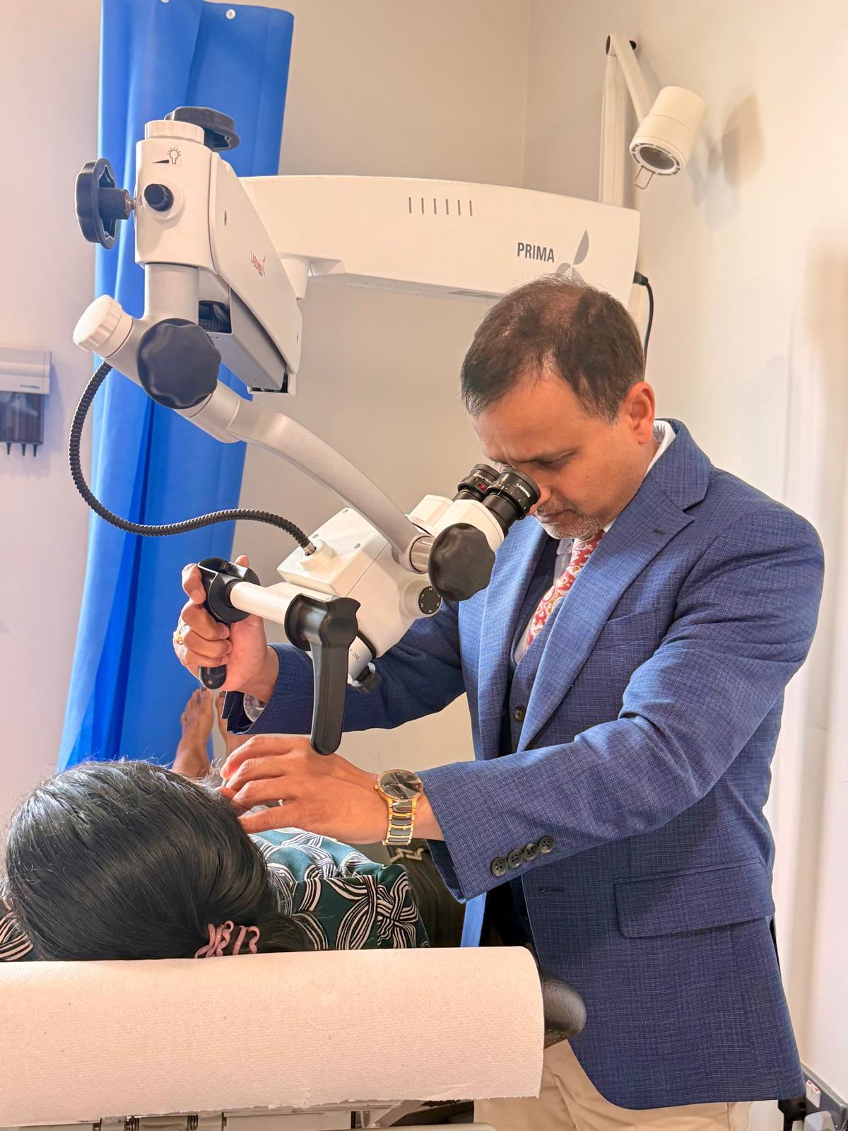 Microsuction ear wax removal procedure at audiology clinic