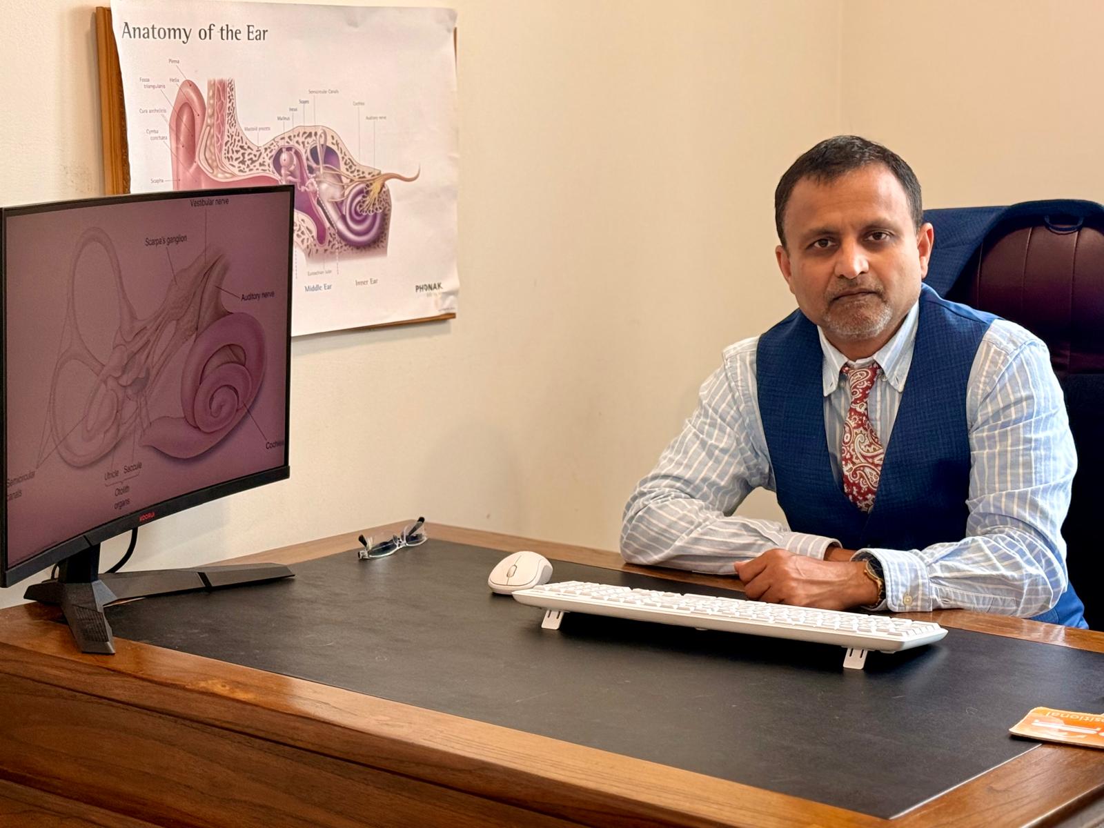 Dr Deepak Kumar hearing consultation at audiology clinic